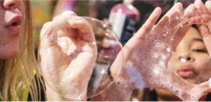 Making bubble during a Lush Party